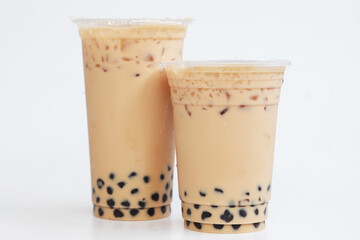 Two cups big and small Iced milk tea with boba bubble Taiwan Style on white backgrond, Isolated...