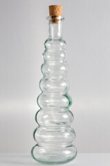 glass bottle of repetitive and curved shapes