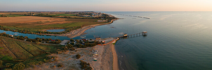 Aerial view of fishing huts with typical italian fishing machine, called 