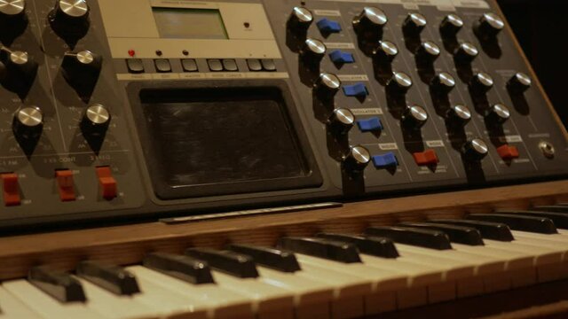 Sound mixer board, synthesizer in studio