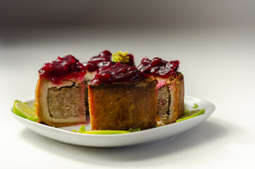 Seasoned British pork, wrapped in crisp, flavoursome pastry served with  beetroot and orange chutney on top