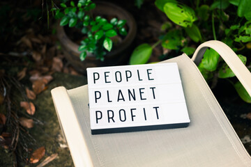 People Planet Profit, Box Sign in the Garden