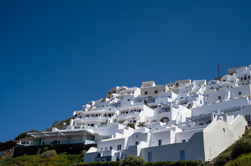 Naklejka premium White architecture of Imerovigli on Santorini island, Greece. Luxury resort. Blue sky. Bottom view.