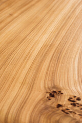 Style wooden slab, saw cut wood treated with varnish close-up on black. Isolate.
