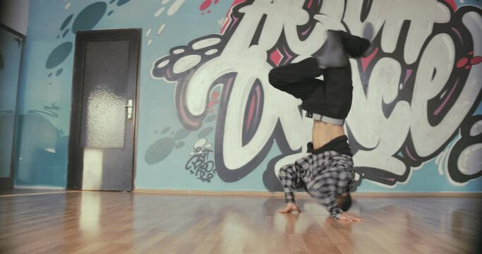 Handsome man break dancing