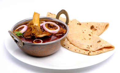 Mutton curry or meat dish with India style bread