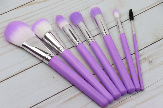 Colorful Makeup Brush Set on wood floor  -Purple