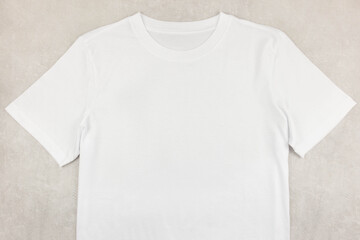 White womens cotton tshirt mockup on gray concrete background. Design t shirt template, print...