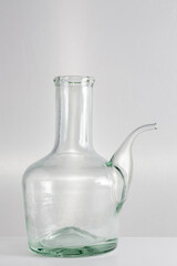 oil jug on gray background