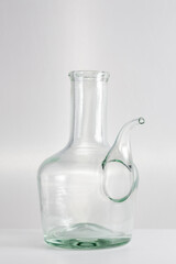 oil jug on gray background