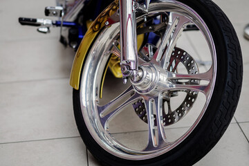chrome wheel of the motorcycle.