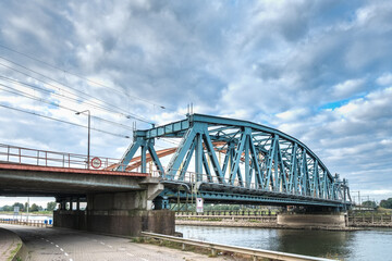 Fototapeta premium Combined bicycle, pedestrian, car and rail bridge in Zutphen, Gelderland Province, The Netherlands