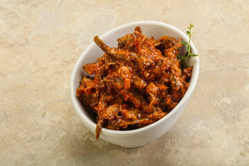 Canned anchovy in tomato sauce