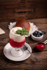 A delicious breakfast with strawberry granita and brioches, sicily.