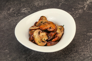 Roasted champignon with herbs and spices