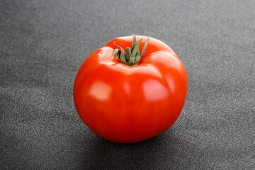 Red ripe big tomato isolated