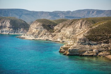 view of the sea, cliffs, beaches and water coves and mountains from Aguamarga, in Cabo de Gata Nijar Park