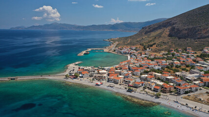 Naklejka na ściany i meble Aerial drone photo of new city of Monemvasia in the heart of Lakonia with beautiful clouds and deep blue sky, Peloponnese, Greece