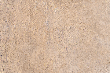 Fototapeta na wymiar Abstract background of a wall outdoors, with white paint on cement. 
