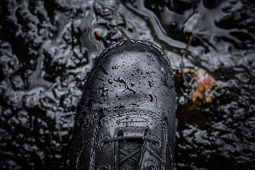 Water over the black boot