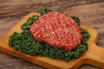 Raw beef burger cutlet for cooking