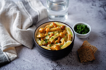 Roasted potato with mushrooms in a bowl