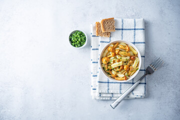 Roasted potato with mushrooms in a bowl