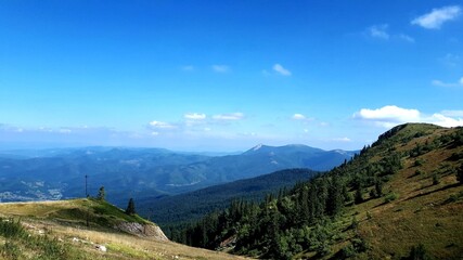 Fototapeta premium View of eastern parts of mountain Jahorina, panorama with clouds and sky, Bosnia and Herzegovina