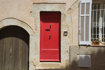 Lanes and facades of colorful houses in Antibes, France