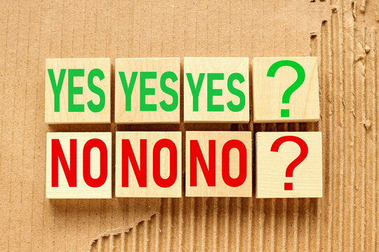 Yes or no. wooden cubes with the text yes and no