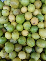 Lemons are put up for sale in a store