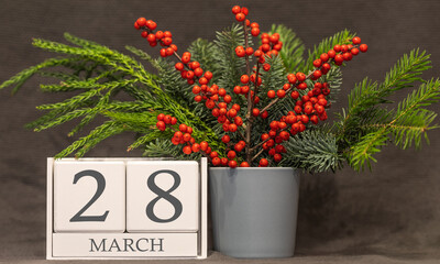 Memory and important date March 28, desk calendar - spring season.
