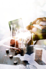 stacking money coins and a house model.save and investment for buy house concept .for the future.save money concept.