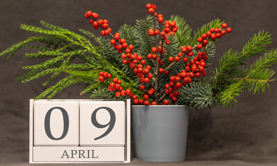 Memory and important date April 9, desk calendar - spring season.