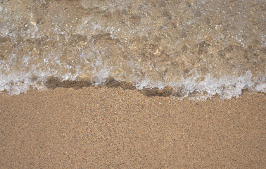 sea waves on the beach. Minimal summer sand composition