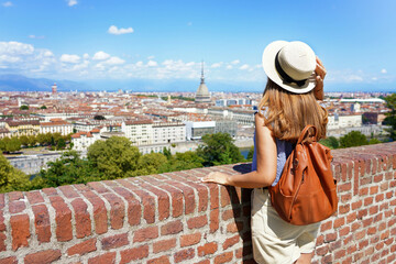 Female tourist enjoying the cityscape of Turin, Italy - obrazy, fototapety, plakaty