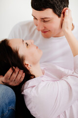 couple man and woman in white photo studio. family psychotherapy. 