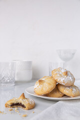 Chocolate filled shortbread cookies in a white kitchen