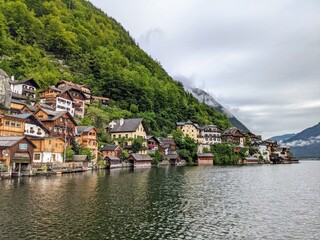 Fototapeta na wymiar Hallstatt Austria city at lake and mountains panorama