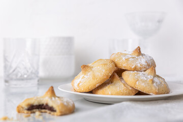 Chocolate filled shortbread cookies in a white kitchen