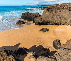 The Volcanic Shoreline of Keawanaku Beach And The Beautiful Blue Water Of La Perouse Bay, Makena-La...