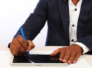 Businessman working with Tablet device and stylus pen as business concept