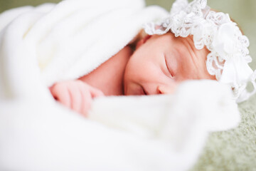 Closeup portrait of a sleeping newborn baby.