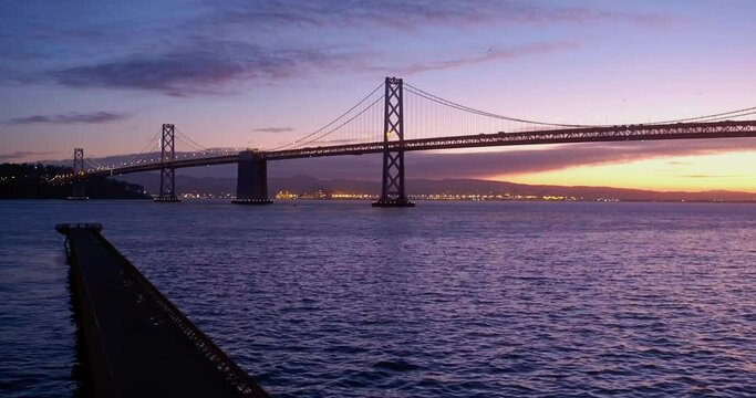 Aerial: San Francisco Bay Bridge at sunrise. California, USA