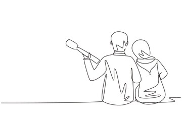 Single one line drawing Arabian couple playing guitar on summer season. Hugging couple sitting at park with guitar. Romantic dating on outdoor nature. Continuous line draw graphic vector illustration