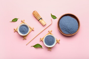Fototapeta na wymiar Composition with powdered blue matcha tea on color background