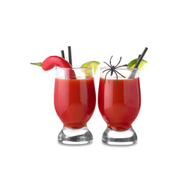 Glasses of tasty bloody Mary cocktail decorated for Halloween on white background