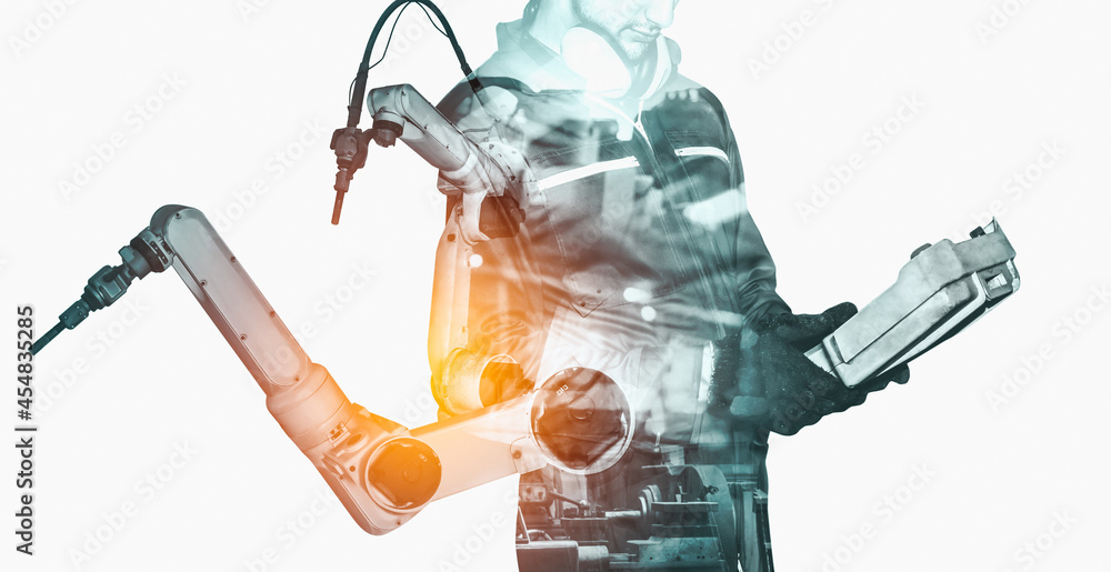 Poster mechanized industry robot arm and factory worker double exposure . concept of robotics technology fo