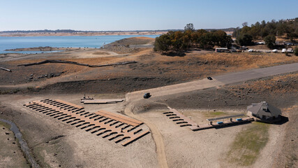 Aerial view of the severe drought conditions of Folsom Lake, a reservoir in Folsom, California, USA.