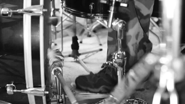 TYCHY, POLAND - Aug 12, 2021: A closeup of a drummer playing the drums during a rock concert in Tychy, Poland in 4K